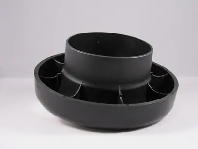 A black circular plastic part object with a hole